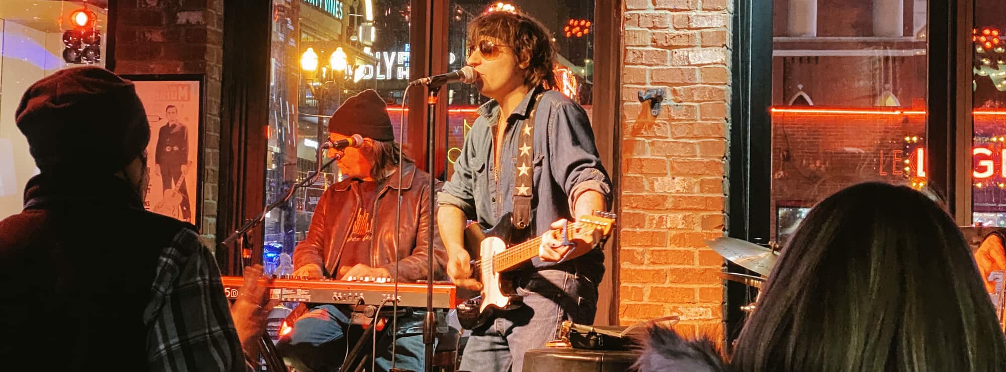 bar singer on guitar in Knoxville