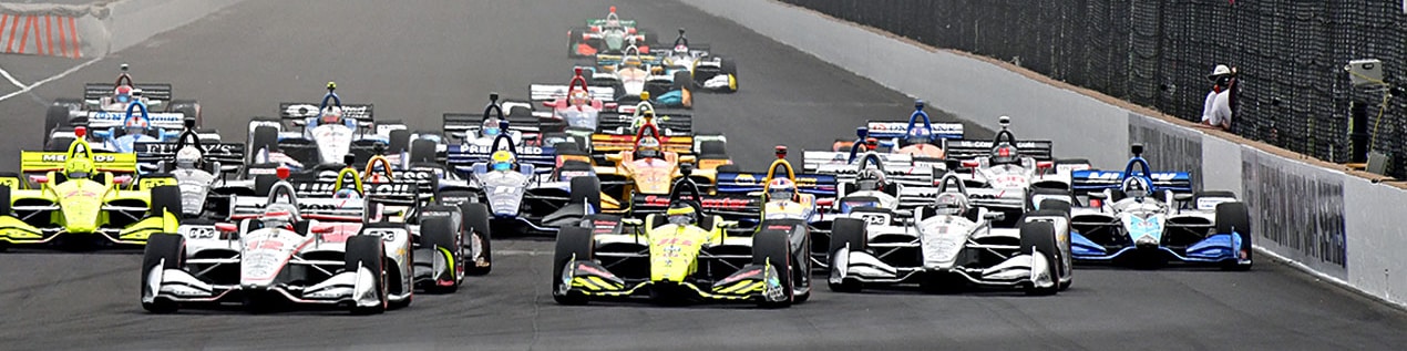 indy cars racing to through the start line Knoxville