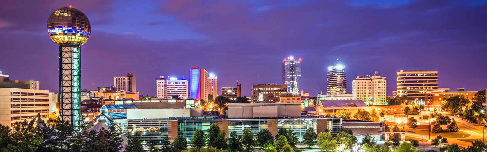 Neon color image of a band playing and people singing along