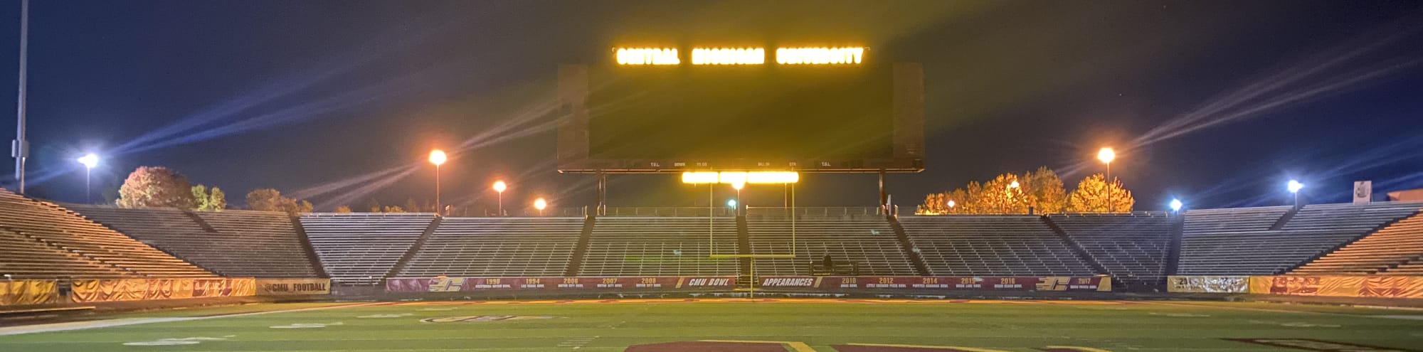 empty football stadium at night under the lights Knoxville